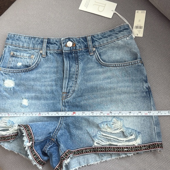 Anthropologie Pilcro Distressed Blue Jean Shorts with Embroidered Hem - Picture 12 of 13